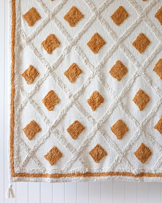 Azra Diamond Tufted Throw Blanket with Tassel in Mustard